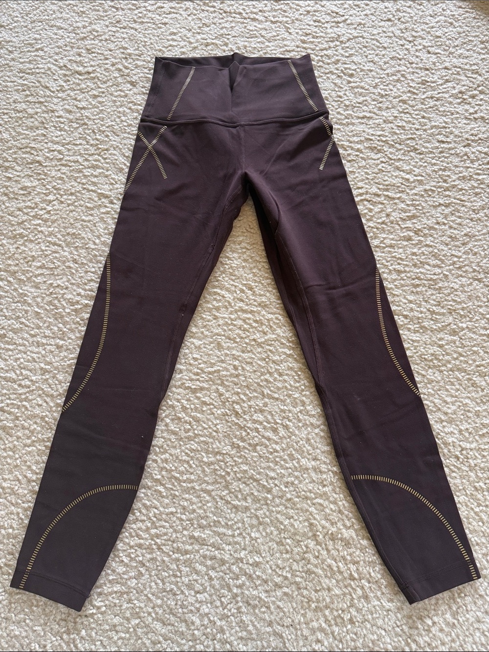 lululemon athletica Black High-Rise Leggings with Gold Stitching